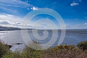 Beautiful Tay and the Tay Rail Bridge in Dundee with Clear blue Skys in Scotland