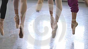 Beautiful teen ballerinas dance and show swan lake performance in ballet school.