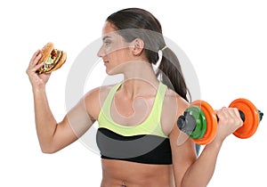 Beautiful Teen Girl Holding Colorful Weights And A Giant Cheeseburger