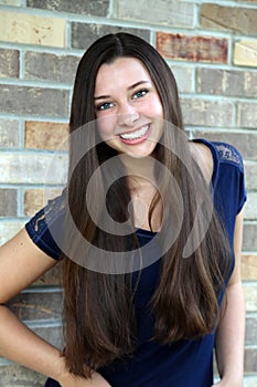 Beautiful teen girl with long hair