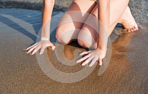 Beautiful teen girl play on beach during holiday