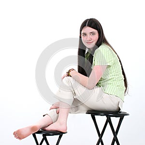 Beautiful Teen Girl Sitting On Stool