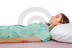 Beautiful teen girl sleeping with comfortable pillow on bed