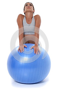 Beautiful Teen Girl Stretching on Exercise Ball