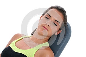 Beautiful Teen Girl Sweating Resting On Workout Bench