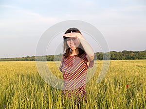 Beautiful Teen Lady Looks in Field