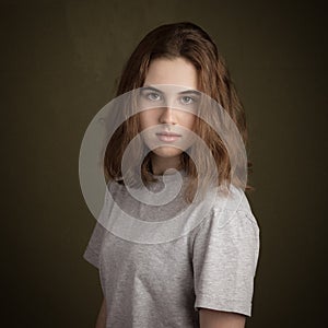 Beautiful Teenage Girl With Bushy Eyebrows In Grey T-Shirt