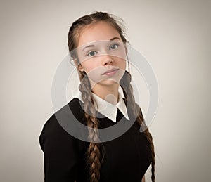 Beautiful Teenage Girl With Plaits Dressed In Black
