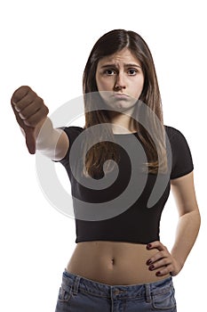 Beautiful teenage girl portrait gesturing thumbs down
