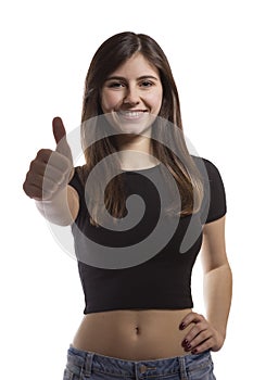 Beautiful teenage girl portrait gesturing thumbs up