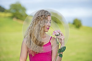 Beautiful teenager girl with rose