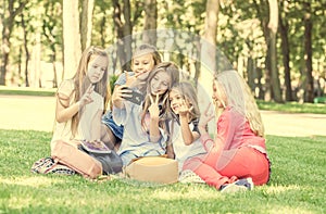 Beautiful teens taking cute friendly selfie