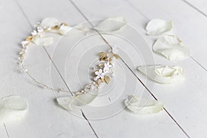 Beautiful tender hair wreath in bride`s hair in rose petals