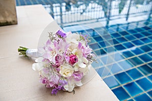 Beautiful tender wedding bouquet of cream roses and eustoma flowers