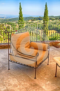Beautiful terrace with armchair, Tuscany, Italy