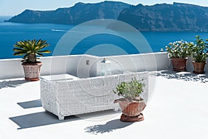 Beautiful terrace in Santorini with view on the volcano