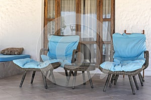 Beautiful terrace with two deck chair near tropical beach near the sea of Zanzibar island, Tanzania, Africa