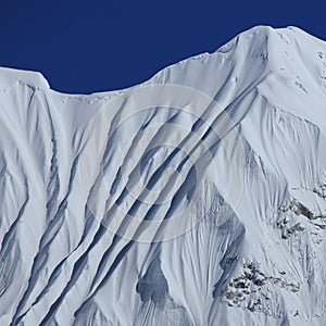 Beautiful textures on a snow covered mountain near Mount Everest