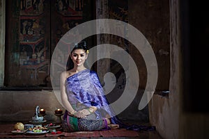 Beautiful Thai girl in Thai traditional costume.