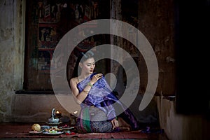 Beautiful Thai girl in Thai traditional costume.