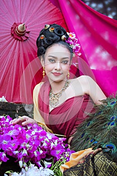 Beautiful Thai girl in traditional dress costume in Choeng Tha a