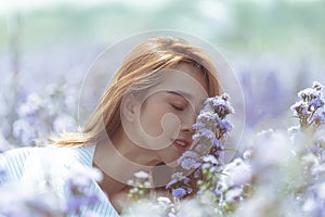 Beautiful Thai lady is walking around in a beautiful flower garden