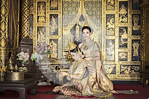 Beautiful Thai women are dressing in traditional Thai national costumes. To prepare for the pantomime drama scene