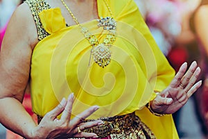 Beautiful Thai women in Thai traditional costume perform Thai dance