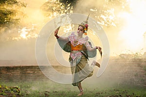 Beautiful Thai young woman portrait in Kinnaree traditional dress costume Art culture Thailand Dancing in masked khon Kinnaree in