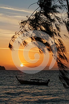 Beautiful Thailand travel island `Koh Lipe` peace sea sand beach with twilight morning sunrise sky background landscape and silhou