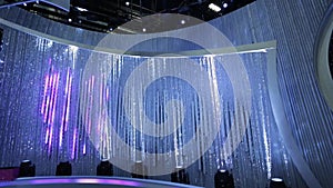 Beautiful Tilt up from empty stage to shiny beaded curtain to top of studio/set