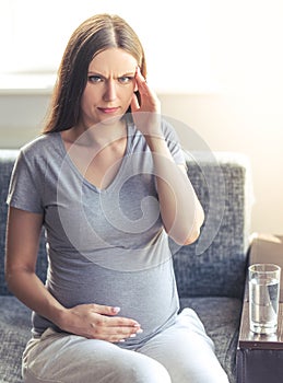 Beautiful tired pregnant woman