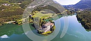 Beautiful Toblino lake is considered one of the most romantic lakes in the Trentino, Italy. aerial drone view photo