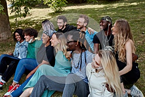 Beautiful tolerant mixed race people gathered together to show that friendship has no race