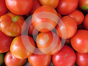Beautiful tomatoes of nice color and delicious taste photo