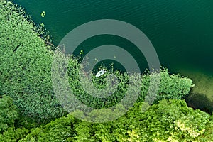 Beautiful top down aerial view of a lake in Moletai region, famous or its lakes