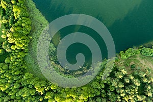 Beautiful top down aerial view of a lake in Moletai region, famous or its lakes