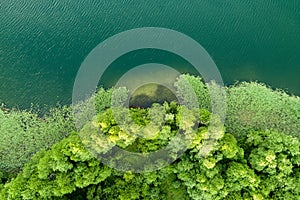 Beautiful top down aerial view of a lake in Moletai region, famous or its lakes