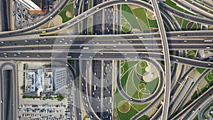 Beautiful top drone aerial view on long busy highway road junction in urban Dubai city modern panorama