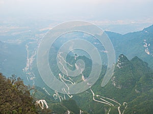 Beautiful Top view of Tongtian Road the winding Road  99  curves road to The Heaven`s Gate,