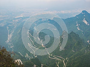 Beautiful Top view of Tongtian Road the winding Road  99  curves road to The Heaven`s Gate,