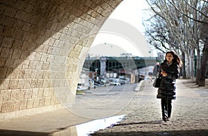 Beautiful tourist walking in Paris