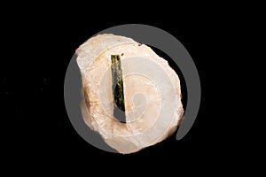 Beautiful tourmaline in Quartz Crystal cluster gemstone isolated on black background