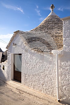 Beautiful town of Alberobello with typical trulli houses built from stone, main touristic district, Apulia region, Southern Italy