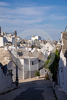 Beautiful town of Alberobello with typical trulli houses built from stone, main touristic district, Apulia region, Southern Italy