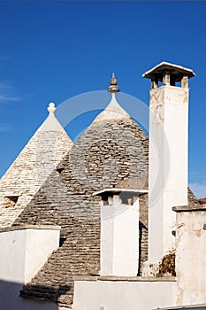 Beautiful town of Alberobello with typical trulli houses built from stone, main touristic district, Apulia region, Southern Italy