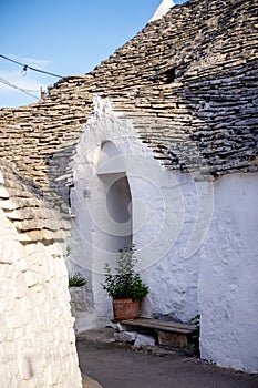 Beautiful town of Alberobello with typical trulli houses built from stone, main touristic district, Apulia region, Southern Italy