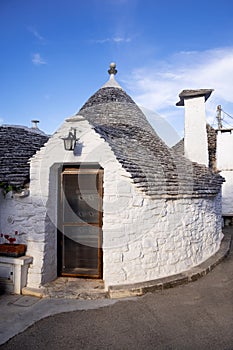 Beautiful town of Alberobello with typical trulli houses built from stone, main touristic district, Apulia region, Southern Italy