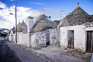 Beautiful town of Alberobello with typical trulli houses built from stone, main touristic district, Apulia region, Southern Italy