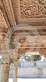 Beautiful traditional building from white carving at lake. Raja